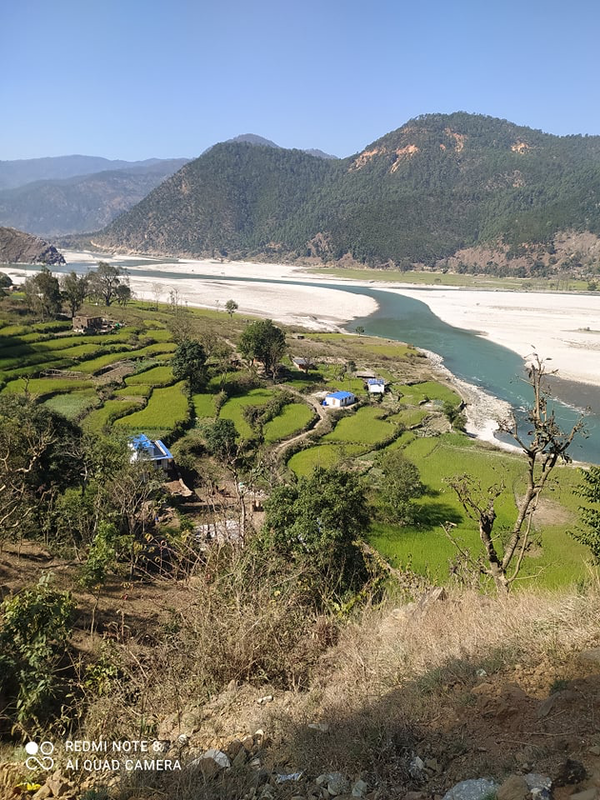 River and slope farm landscape in Nepal